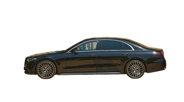 Side view of a black luxury sedan against a white background.